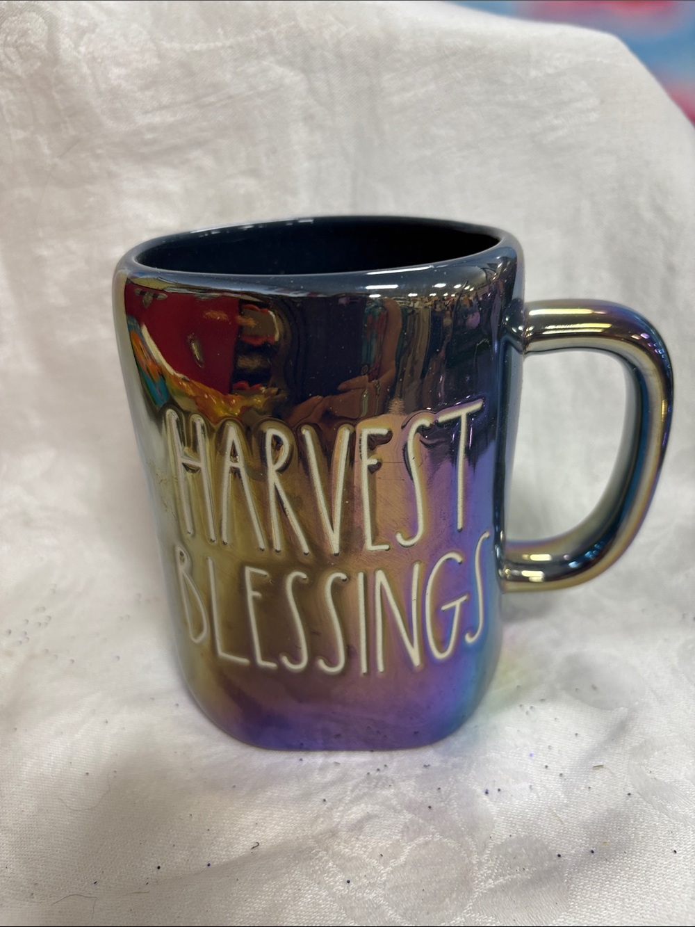 Rae Dunn "Harvest Blessings" mug featuring an iridescent, oil-slick style finish